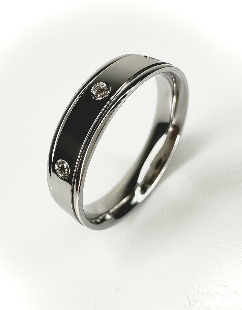 A contemporary diamond set 5mm flat track edge ring from our exclusive wedding band for him collection.