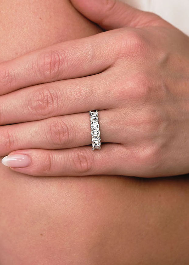Side profile of the 2ct emerald cut diamond band, showcasing the flat step-cut profile in our wedding bands for women range.