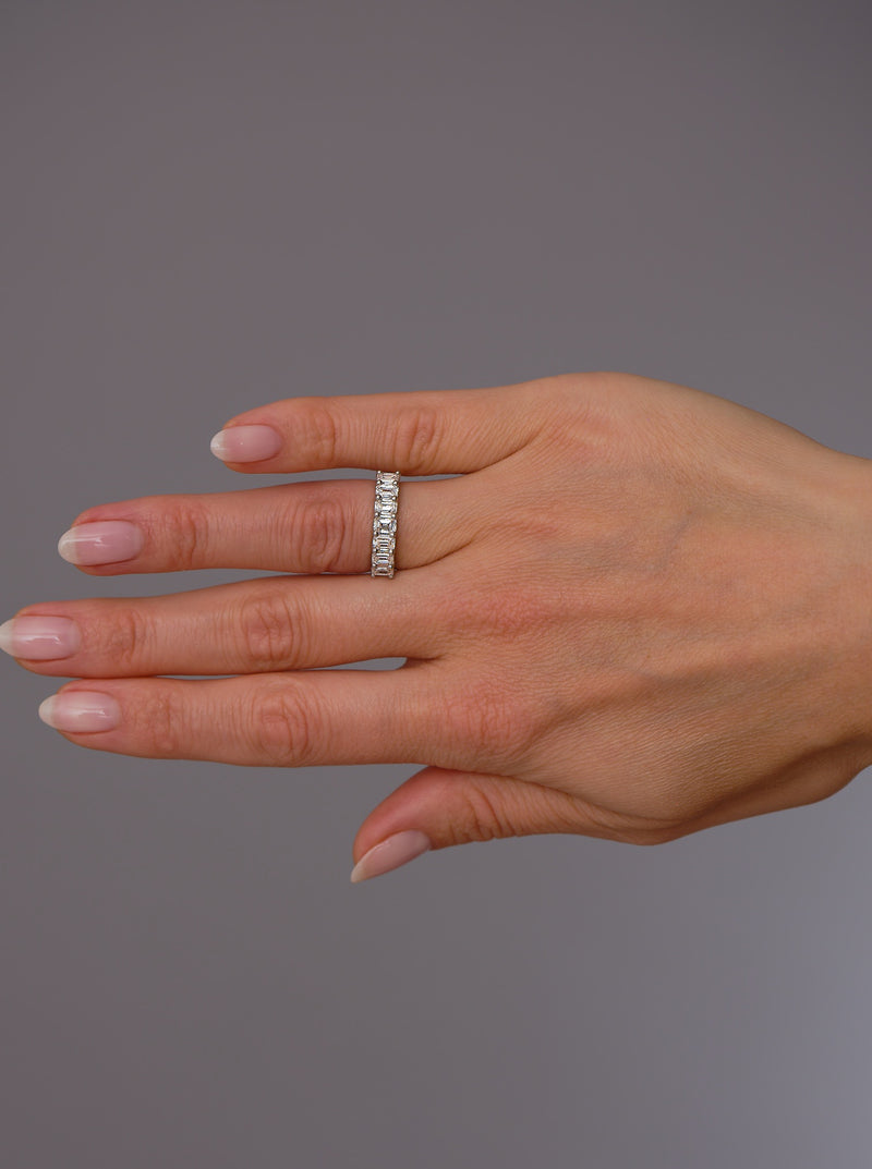 A classic comfort fit 2ct emerald cut diamond eternity ring from our wedding bands for women collection.