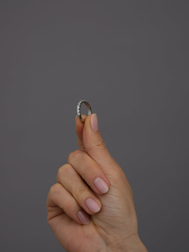 Side profile of a 0.70ct eternity style women’s diamond engagement band.